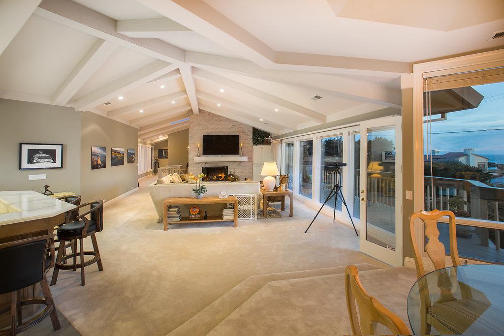 1003 Rodeo Road Pebble Beach, CA 93953 - Photo 5 of 24 a living room with furniture and a flat screen tv
