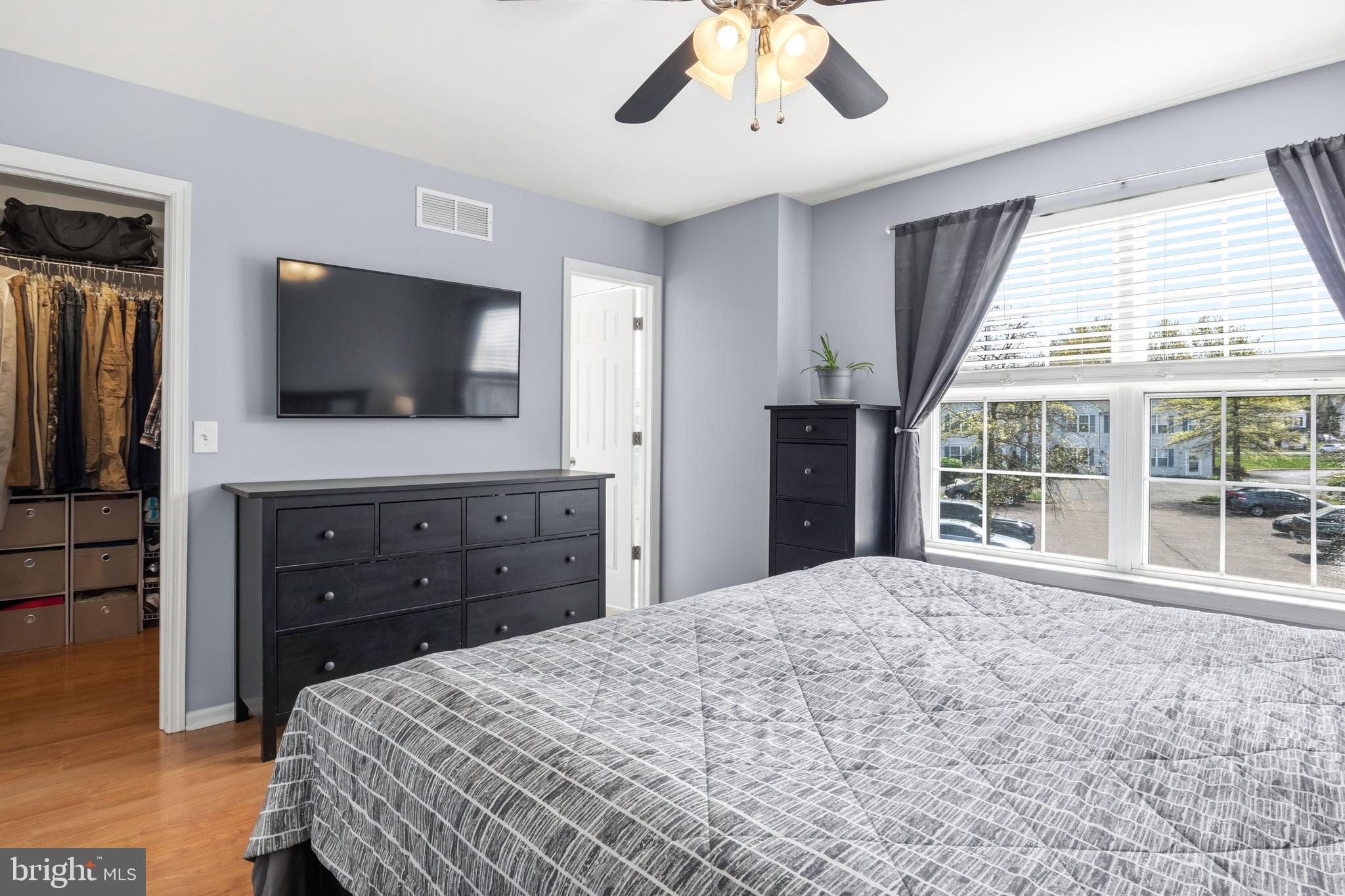 129 Catherine Street, Unit 3 Telford, PA 18969 - Photo 17 of 34 a bedroom with a bed and a flat screen tv
