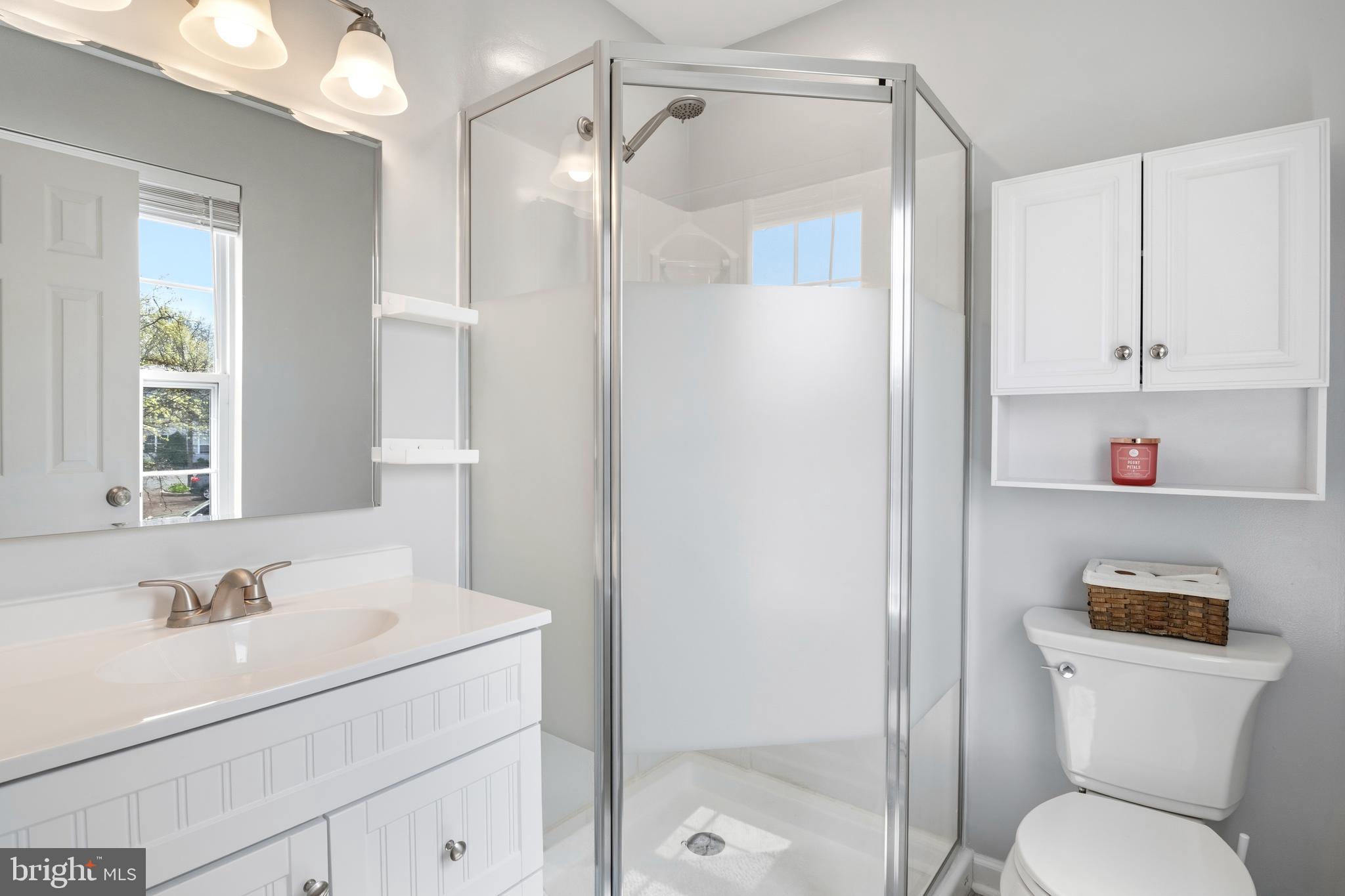 129 Catherine Street, Unit 3 Telford, PA 18969 - Photo 19 of 34 a bathroom with a sink toilet vanity and shower