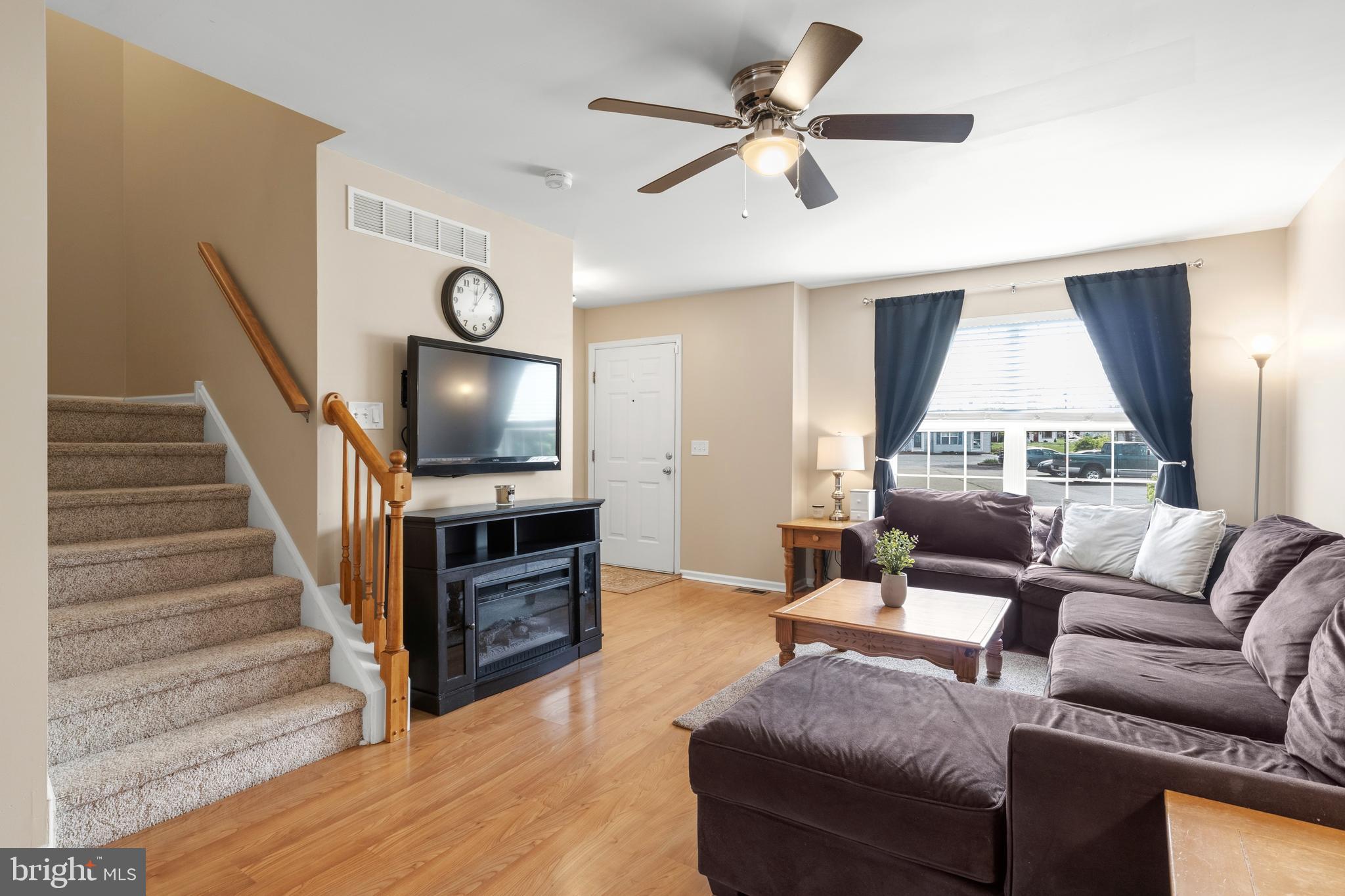 129 Catherine Street, Unit 3 Telford, PA 18969 - Photo 2 of 34 a living room with furniture and a flat screen tv