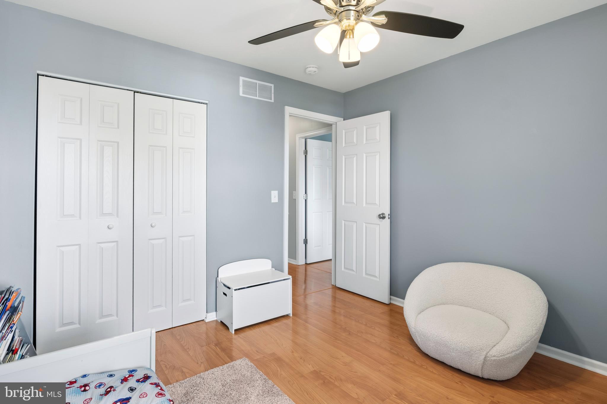 129 Catherine Street, Unit 3 Telford, PA 18969 - Photo 21 of 34 a bedroom with a bed and a chandelier
