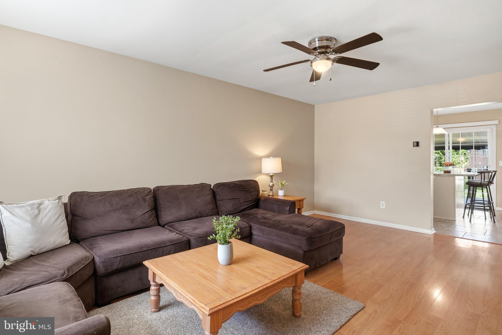 129 Catherine Street, Unit 3 Telford, PA 18969 - Photo 3 of 34 a living room with furniture and a wooden floor