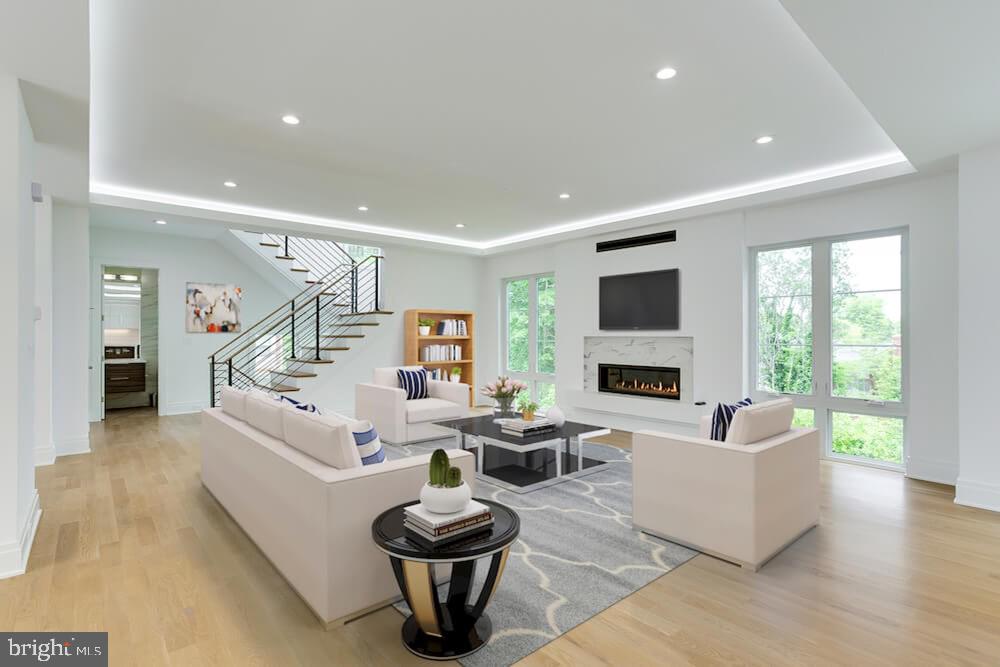 2925 West Ox Road Herndon, VA 20171 - Photo 11 of 38 a living room with furniture and a flat screen tv