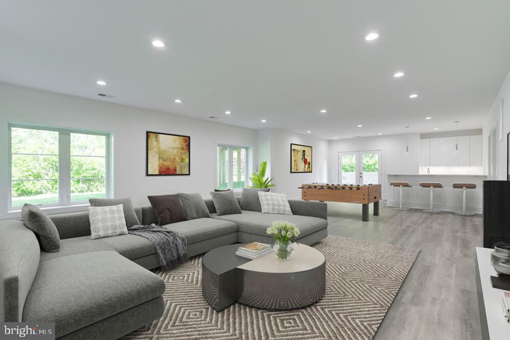 2925 West Ox Road Herndon, VA 20171 - Photo 18 of 38 a living room with furniture and a large window