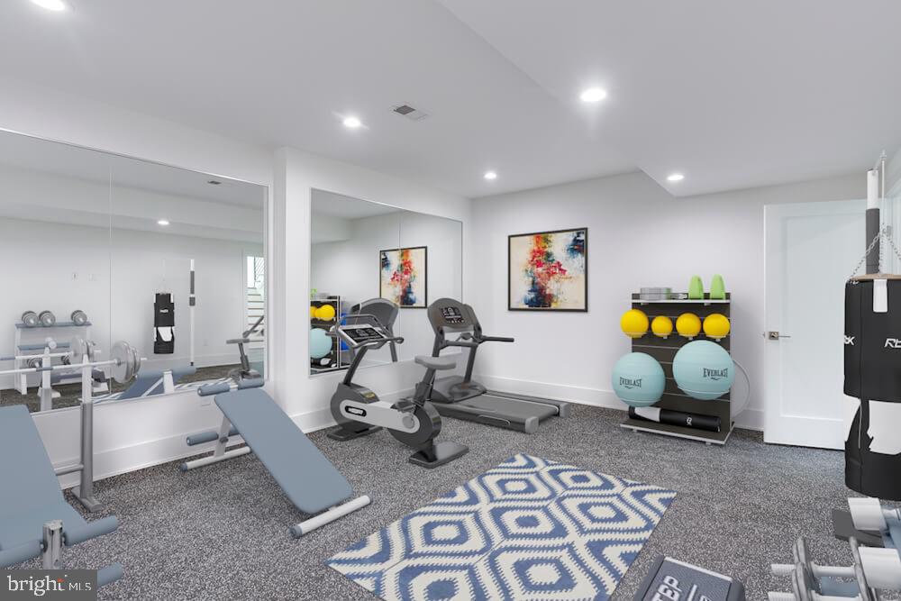 2925 West Ox Road Herndon, VA 20171 - Photo 20 of 38 a living room with furniture gym equipment and a rug