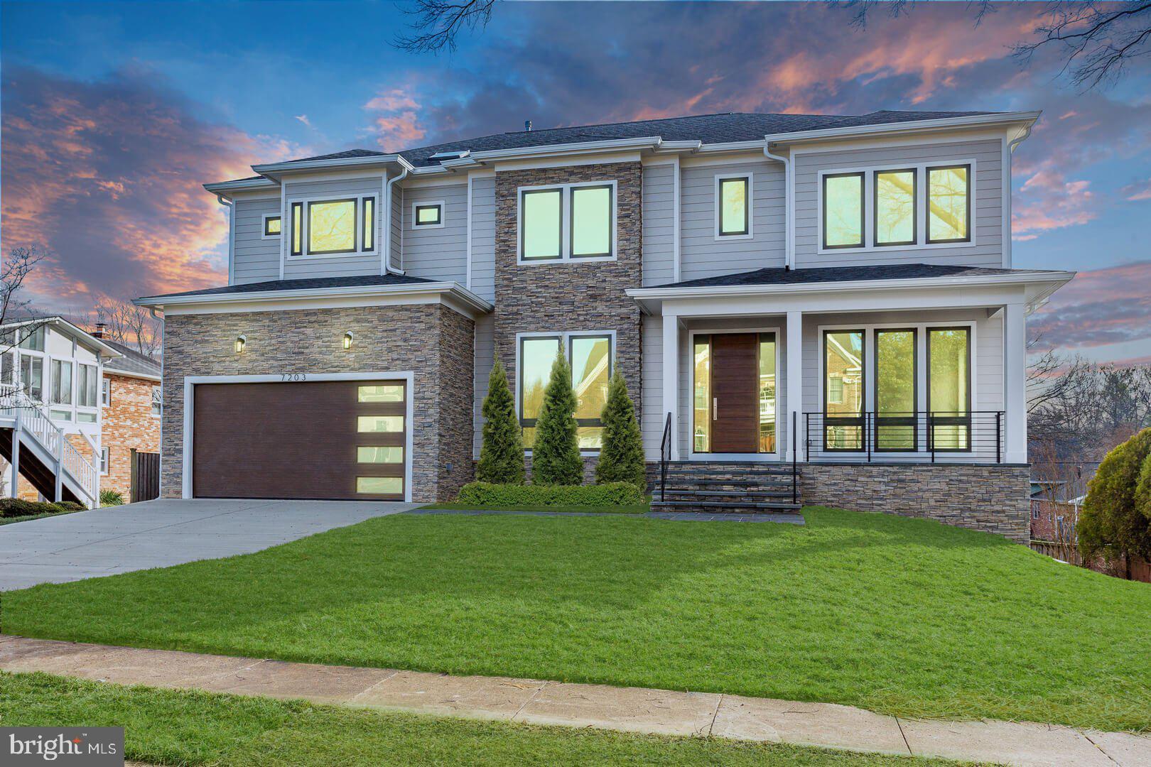 2925 West Ox Road Herndon, VA 20171 - Photo 21 of 38 a view of a brick house with a yard