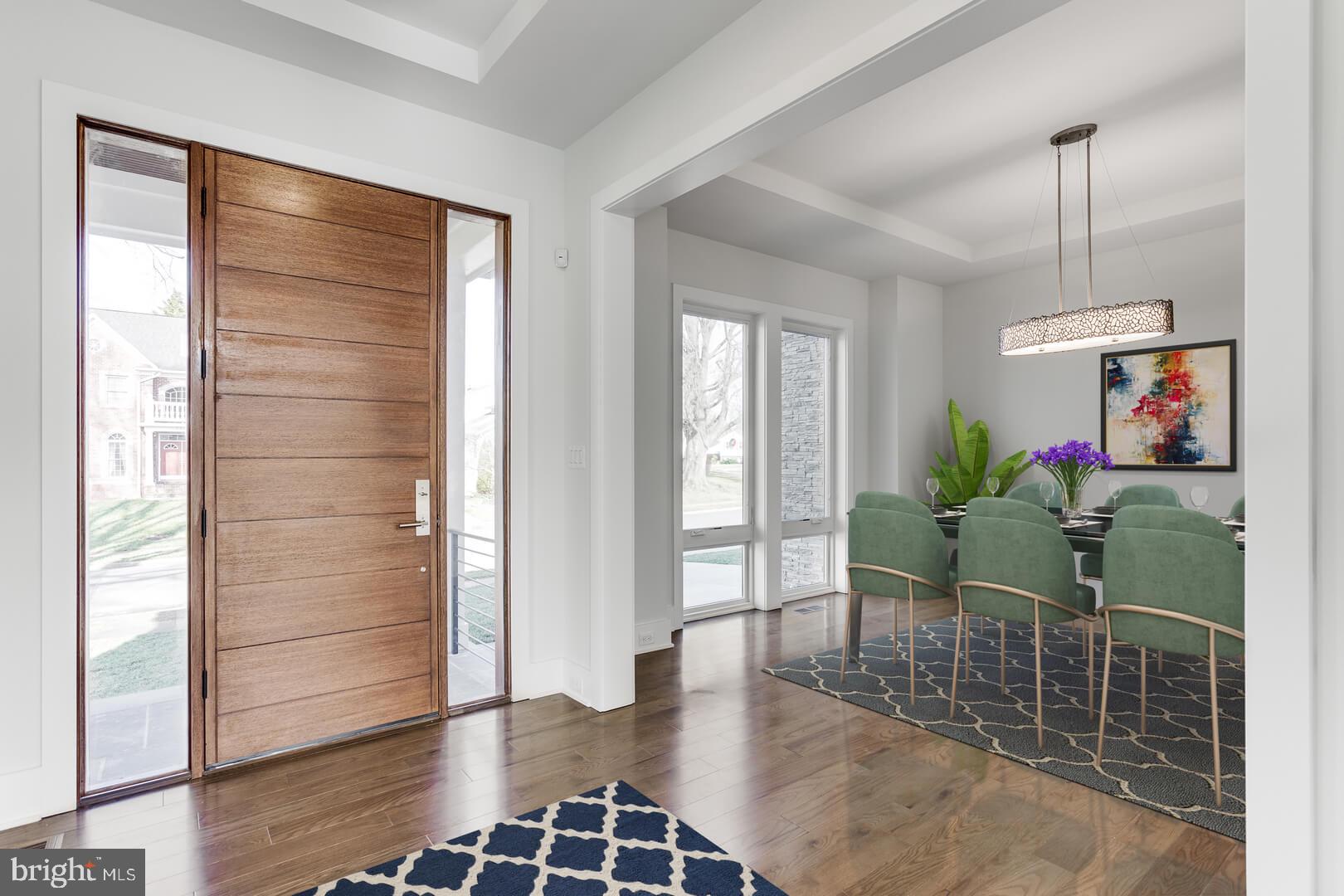 2925 West Ox Road Herndon, VA 20171 - Photo 22 of 38 a dining room with furniture and wooden floor