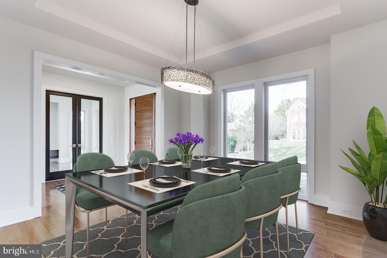 2925 West Ox Road Herndon, VA 20171 - Photo 30 of 38 a living room with furniture potted plant and a chandelier