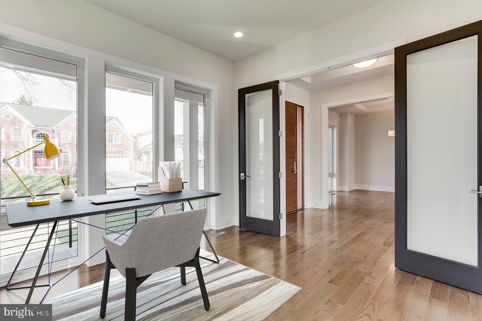 2925 West Ox Road Herndon, VA 20171 - Photo 31 of 38 a view of a room with furniture and large windows