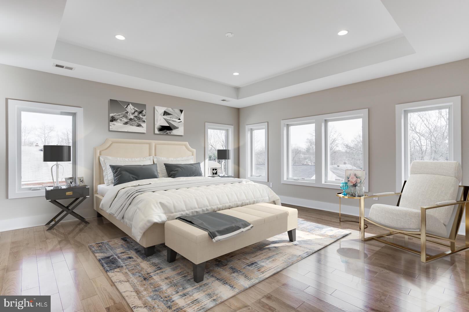 2925 West Ox Road Herndon, VA 20171 - Photo 32 of 38 a bedroom with a large bed couch and a large window