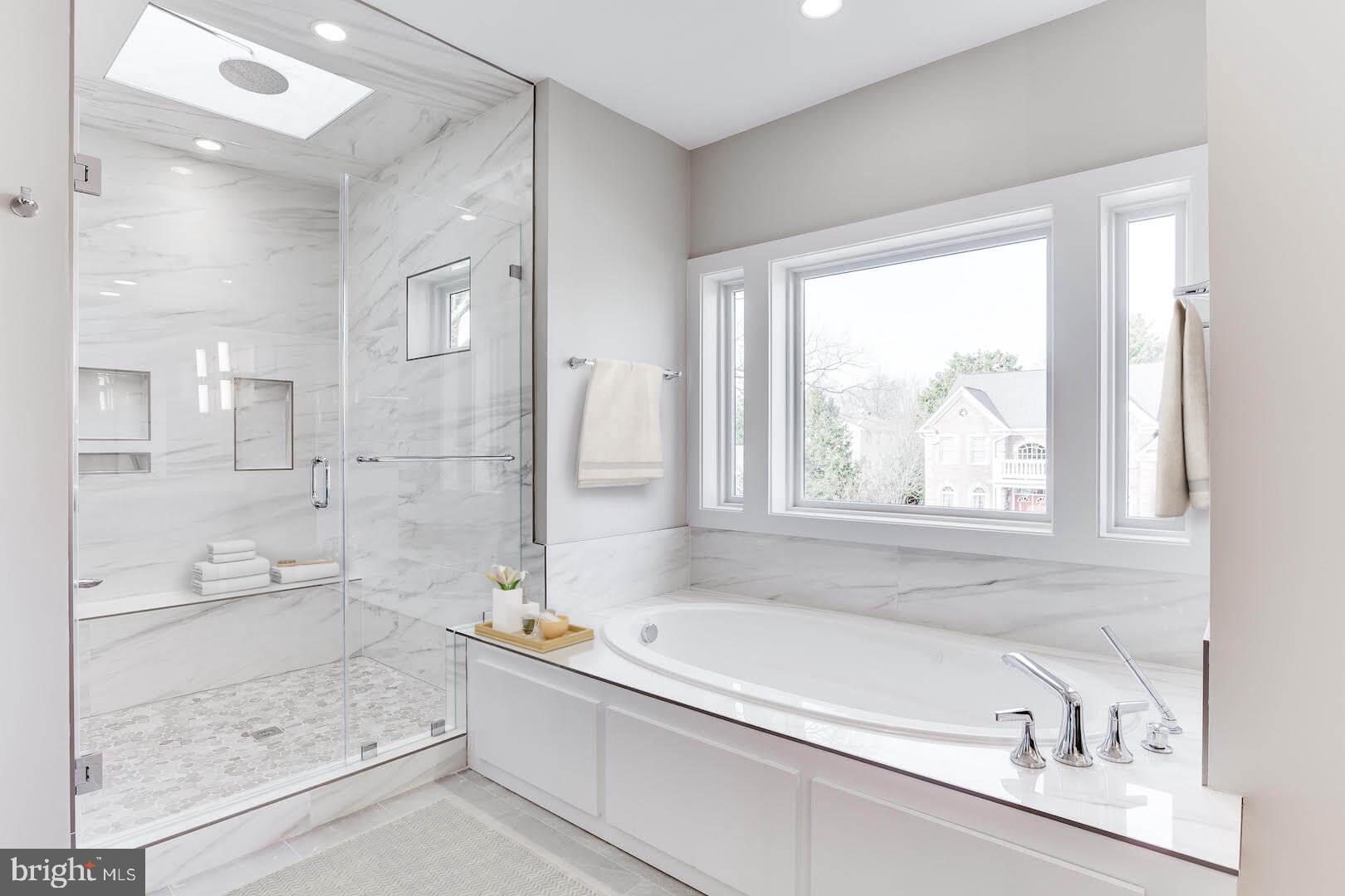 2925 West Ox Road Herndon, VA 20171 - Photo 36 of 38 a bathroom with a bathtub and a shower