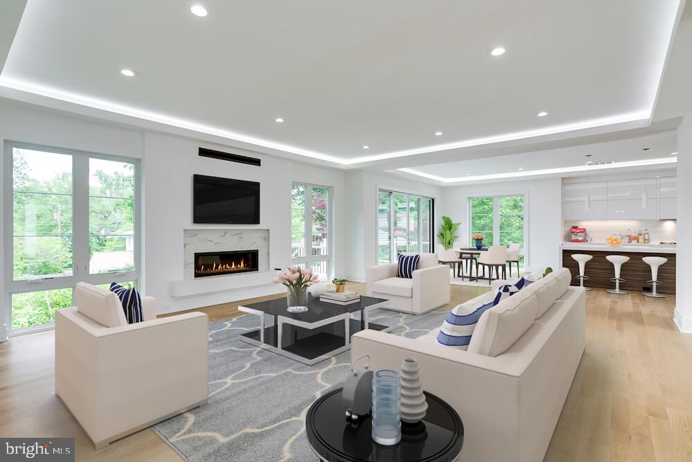 2925 West Ox Road Herndon, VA 20171 - Photo 8 of 38 a living room with furniture fireplace and flat screen tv