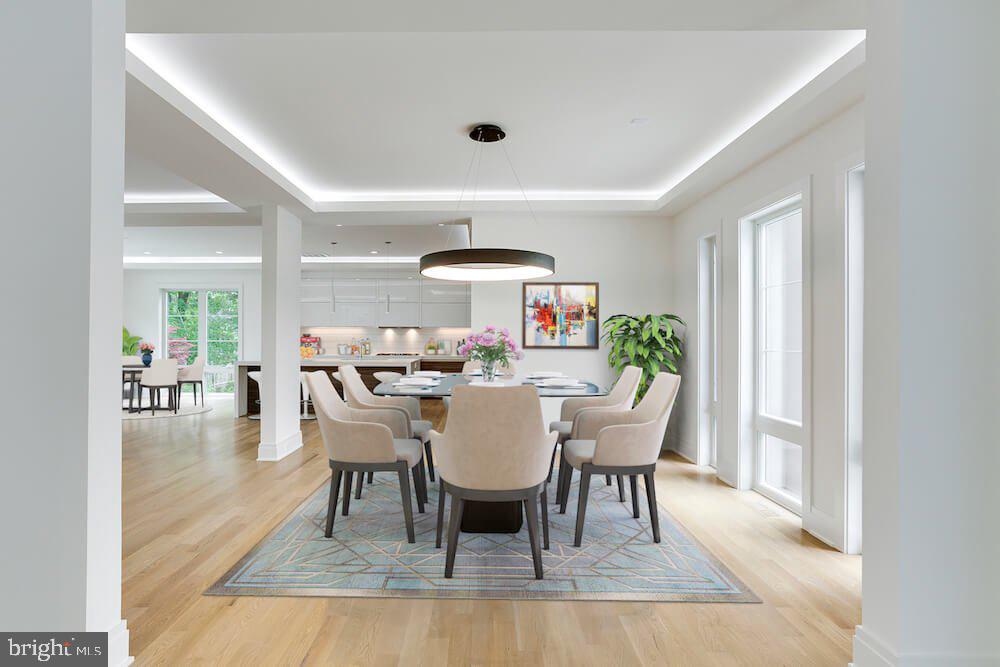 2925 West Ox Road Herndon, VA 20171 - Photo 9 of 38 a dining room with furniture and wooden floor