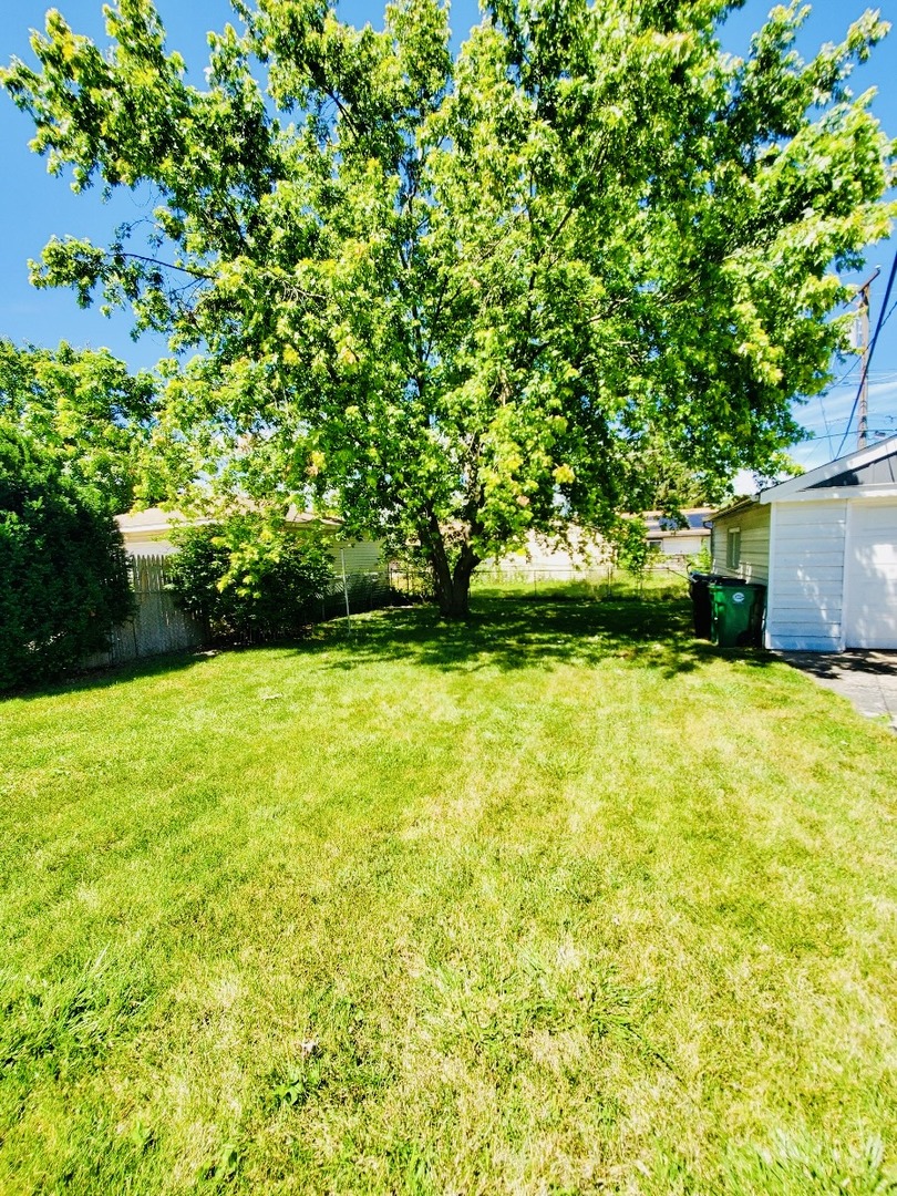 2820 12th Avenue Broadview, IL 60155 - Photo 7 of 7 a view of a yard with an trees