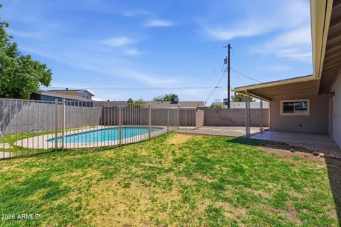 a view of a backyard with a garden