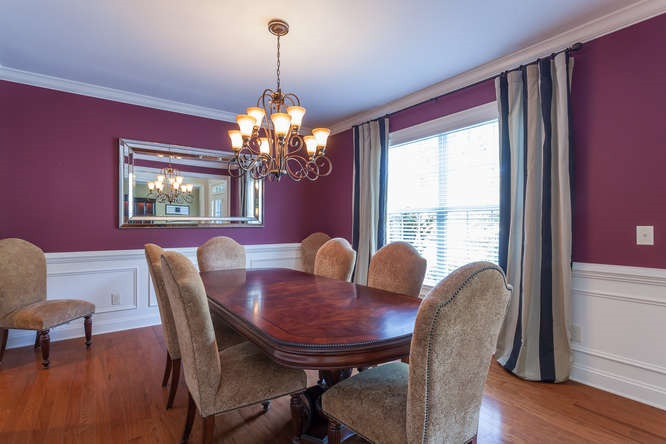 12825 Edsel Drive Raleigh, NC 27613 - Photo 4 of 25 Spacious dining room with wainscoting, crown molding and access to butlers pantry! Dining Room