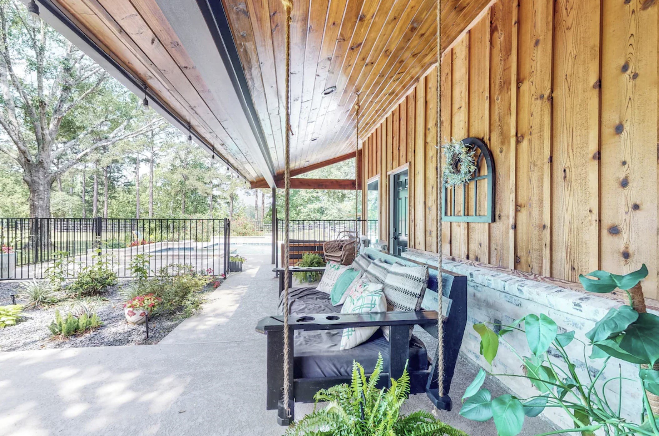 30819 Quinn Road Tomball, TX 77375 - Photo 29 of 30 a view of a garden with plants and outdoor seating