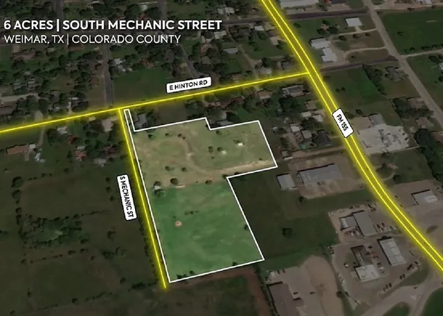 an aerial view of residential building with ocean view