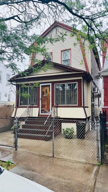 89-09 86th Street Queens, NY 11421 - Photo 1 of 1 a front view of a house with a yard