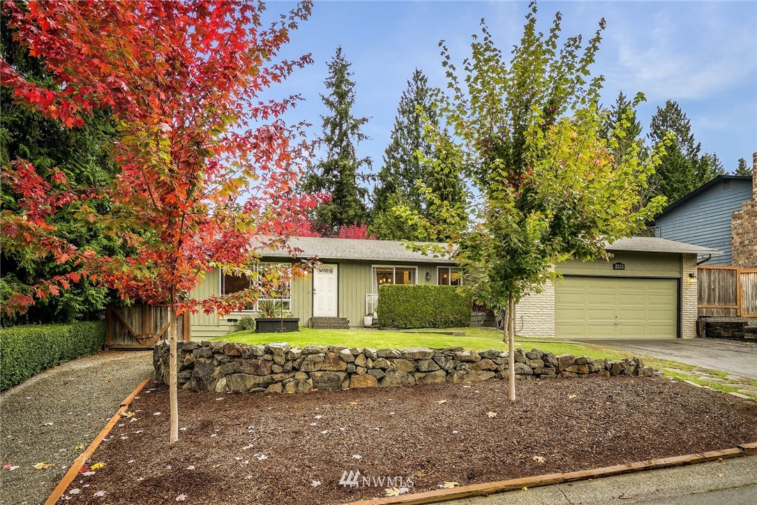 2233 177th Street Southeast Bothell, WA 98012 - Photo 22 of 25 front view of a house with a tree