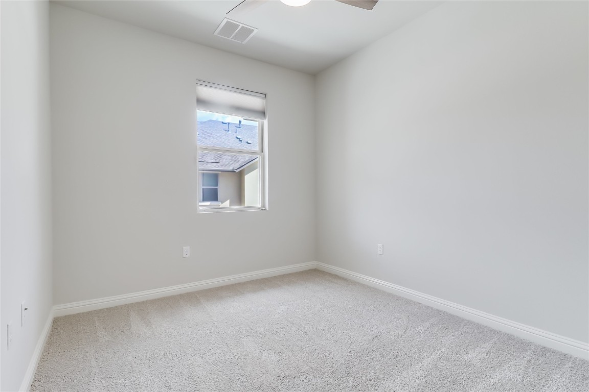 6814 East Riverside Drive, Unit 32 Austin, TX 78741 - Photo 18 of 27 an empty room with a window