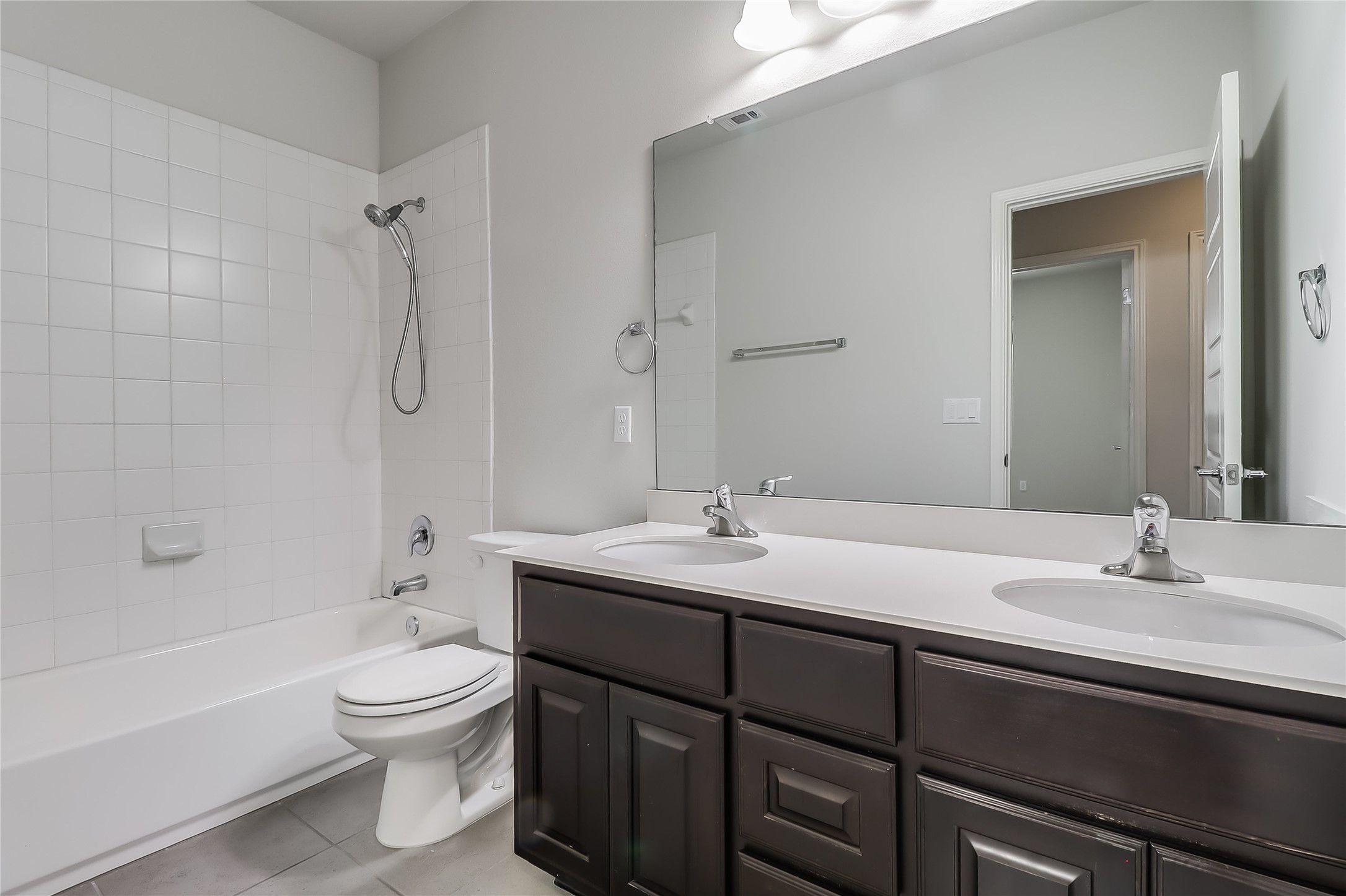 6814 East Riverside Drive, Unit 32 Austin, TX 78741 - Photo 18 of 26 The full secondary bathroom also comes with a dial vanity and offers a shower/tub combo.