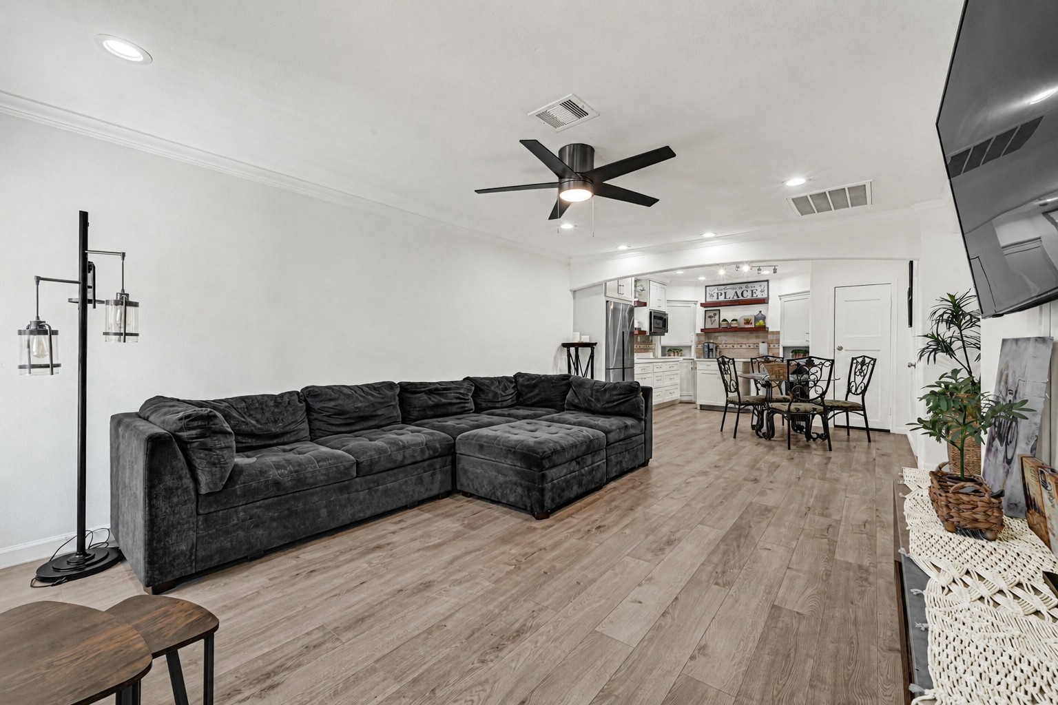 2809 Tooke Street Houston, TX 77023 - Photo 1 of 50 a living room with furniture and a wooden floor