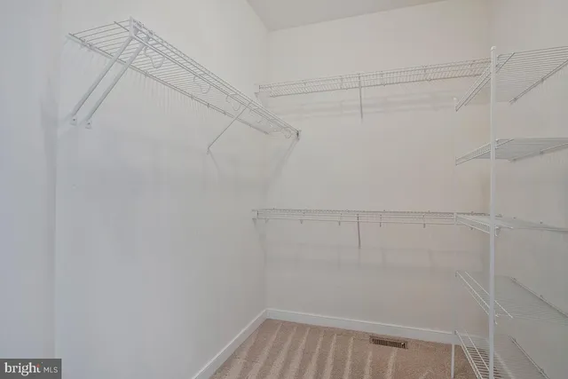 en empty room with windows