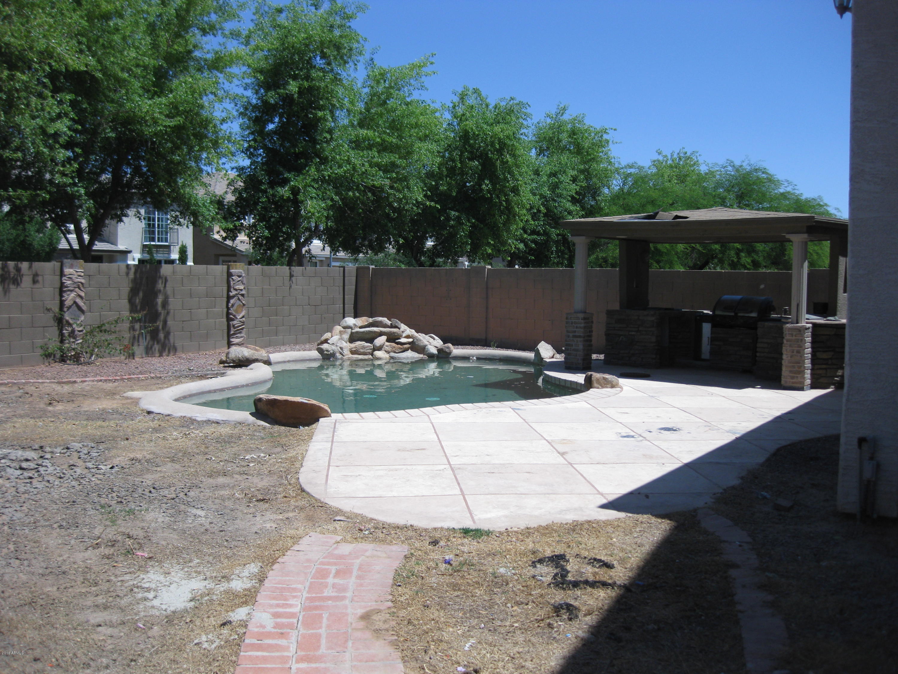 4022 West Vineyard Road Phoenix, AZ 85041 - Photo 23 of 24 Vineyard-Pool and Backyard