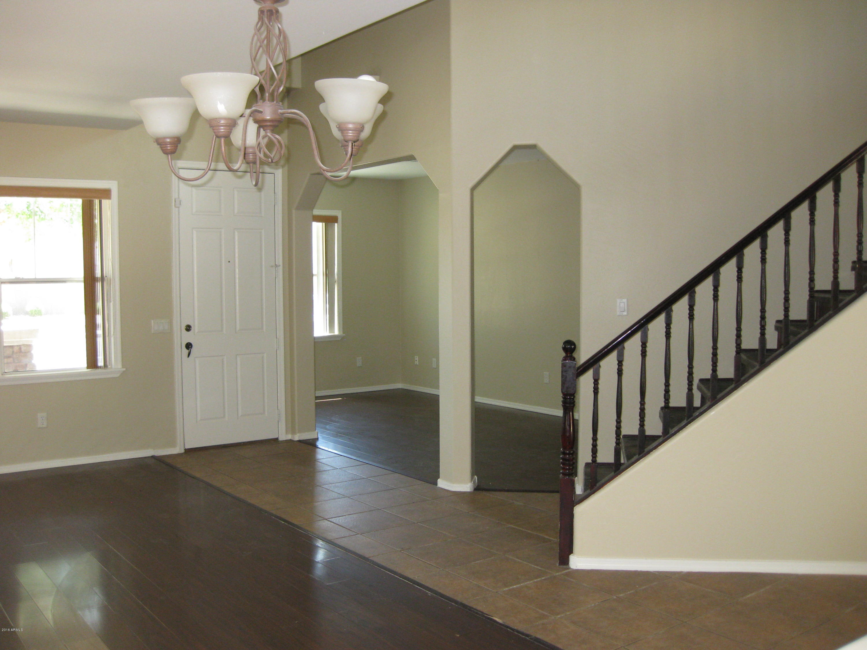 4022 West Vineyard Road Phoenix, AZ 85041 - Photo 4 of 24 Vineyard-Entry and Den