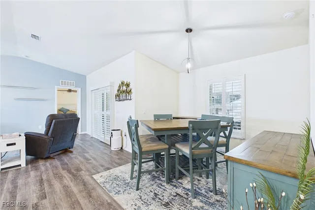 a view of a dining room with furniture