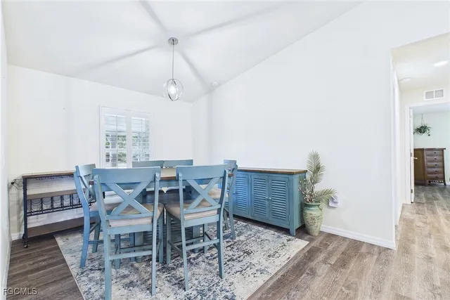 a view of a dining room with furniture