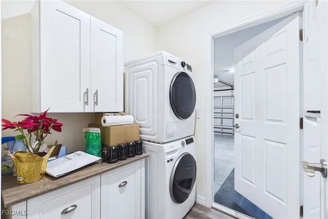 a view of a garage with rack and bicycle