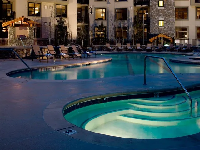 a view of pool with outdoor seating