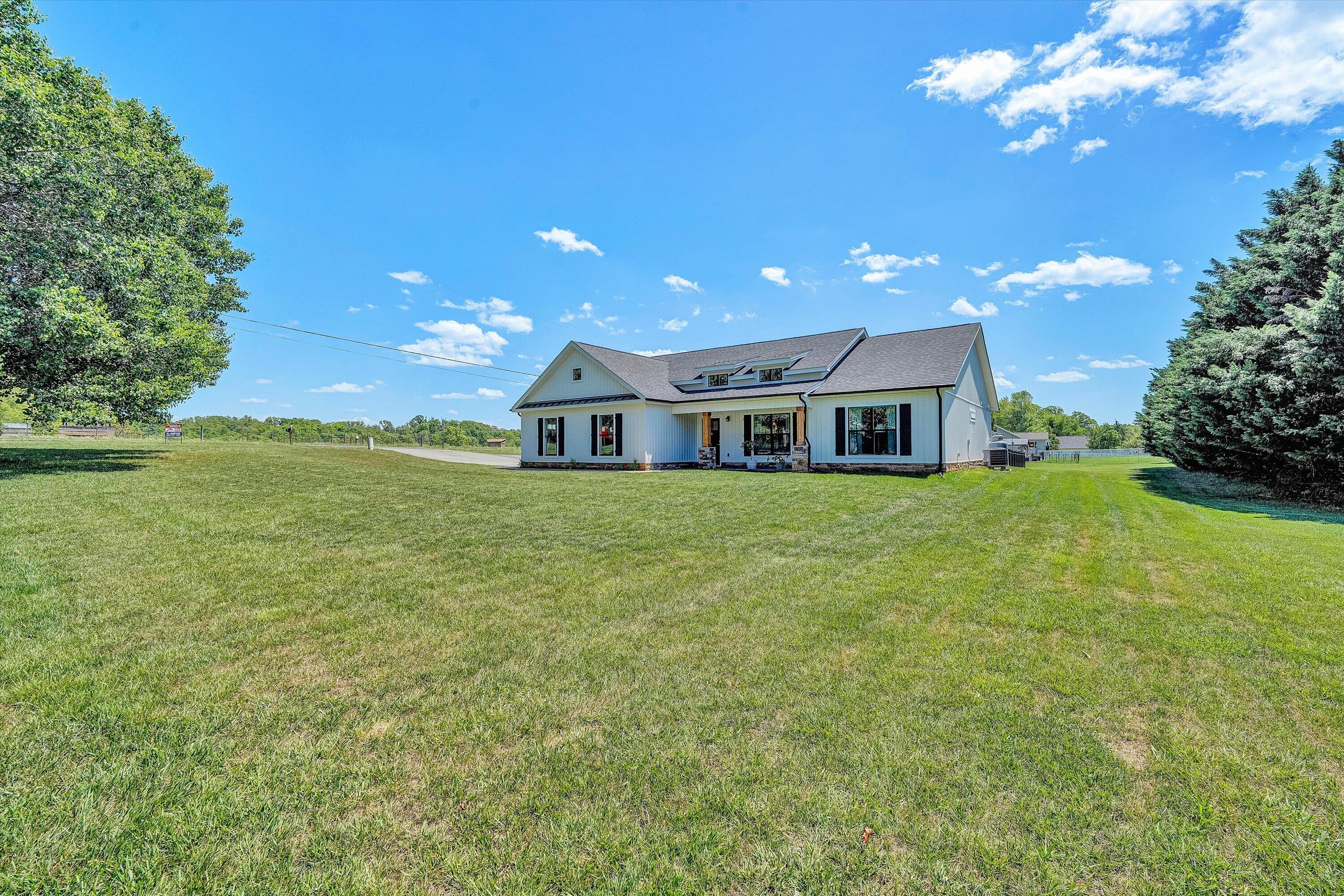 915 Morewood Road Hardy, VA 24101 - Photo 43 of 58 a house view with swimming pool and garden