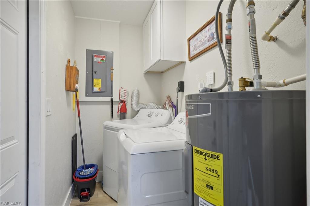 501 Penn Road West Lehigh Acres, FL 33936 - Photo 26 of 27 a utility room with dryer and washer