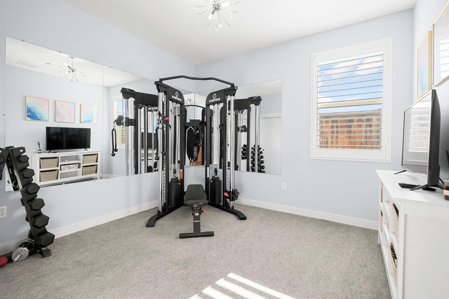 1642 Mcmanis Lane Ripon, CA 95366 - Photo 10 of 44 a view of a livingroom with a flat screen tv
