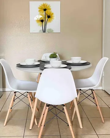 a view of a table and chairs in the kitchen