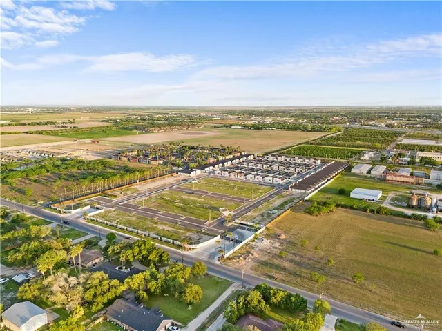 a view of a balcony with outdoor seating