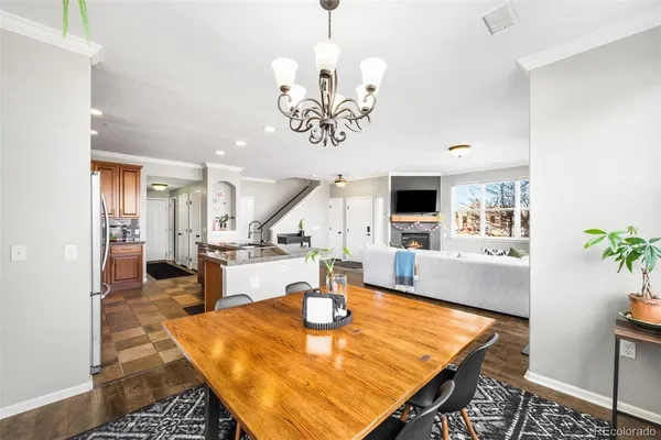a view of a living room and kitchen