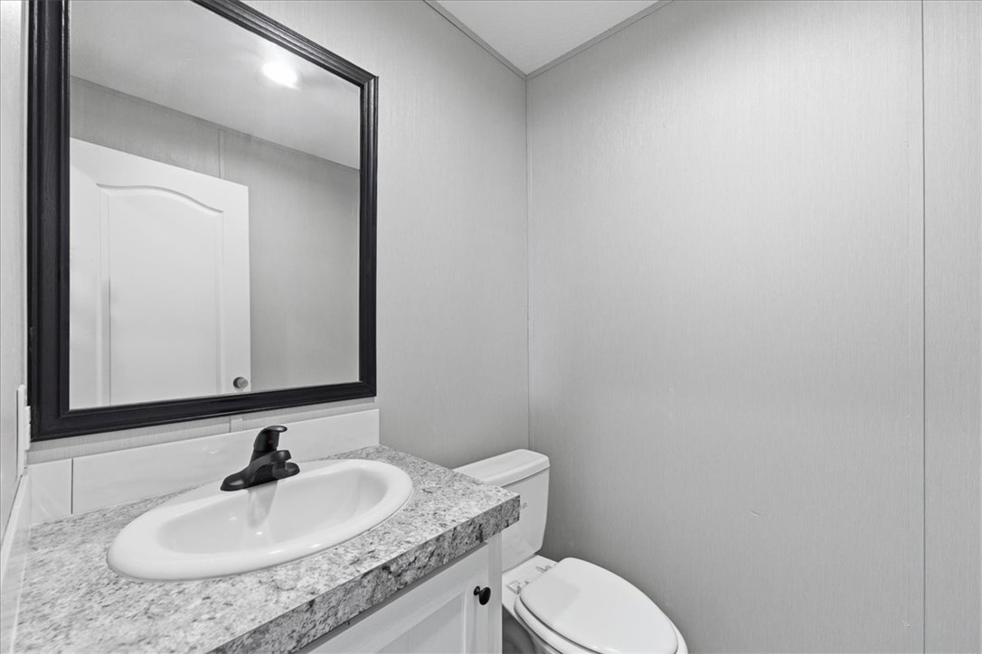 205 Union Court West Union, SC 29696 - Photo 24 of 28 This additional half bath is an extra upgrade from the standard home.