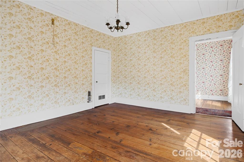 11124 Eastfield Road Huntersville, NC 28078 - Photo 24 of 41 a view of empty room with wooden floor and fan