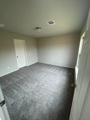 an empty room with a natural light