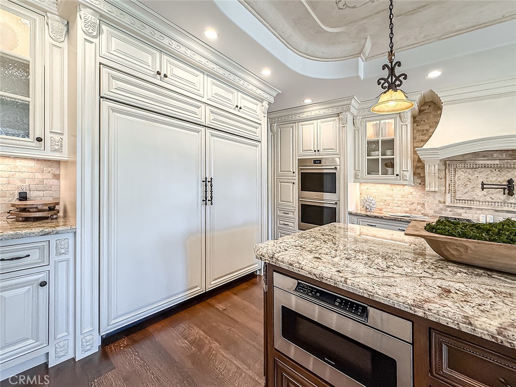 3826 Bowsprit Circle Westlake Village, CA 91361 - Photo 14 of 72 a view of a kitchen with granite countertop cabinets and refrigerator