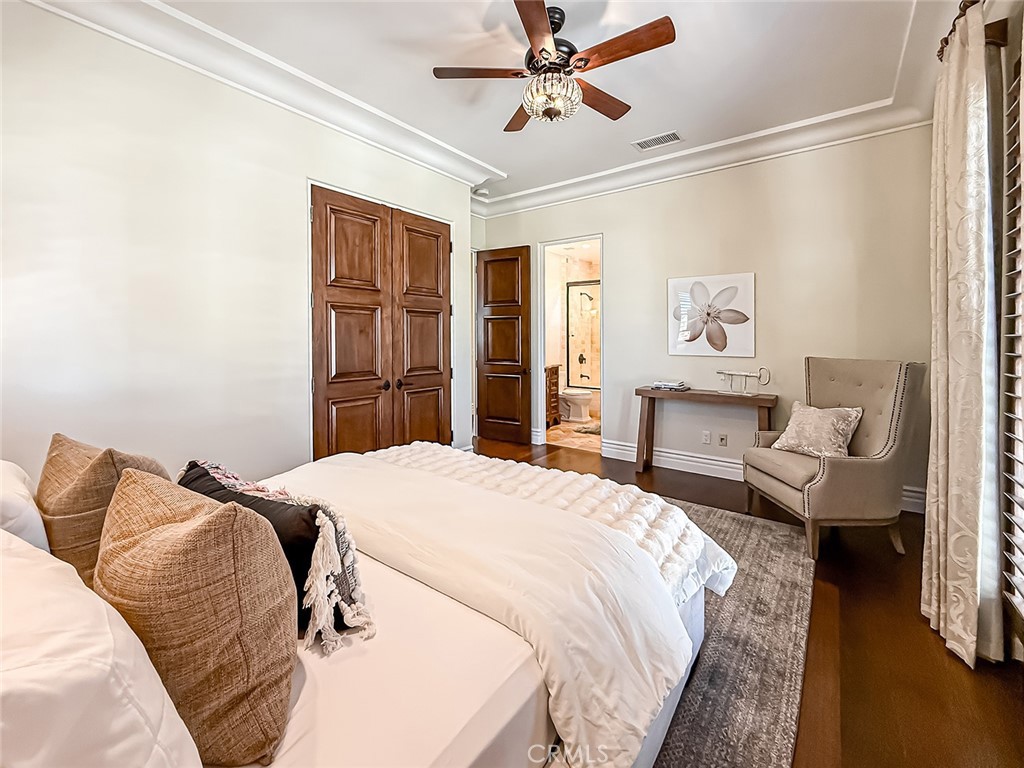 3826 Bowsprit Circle Westlake Village, CA 91361 - Photo 27 of 72 a bedroom with a bed and wooden floor