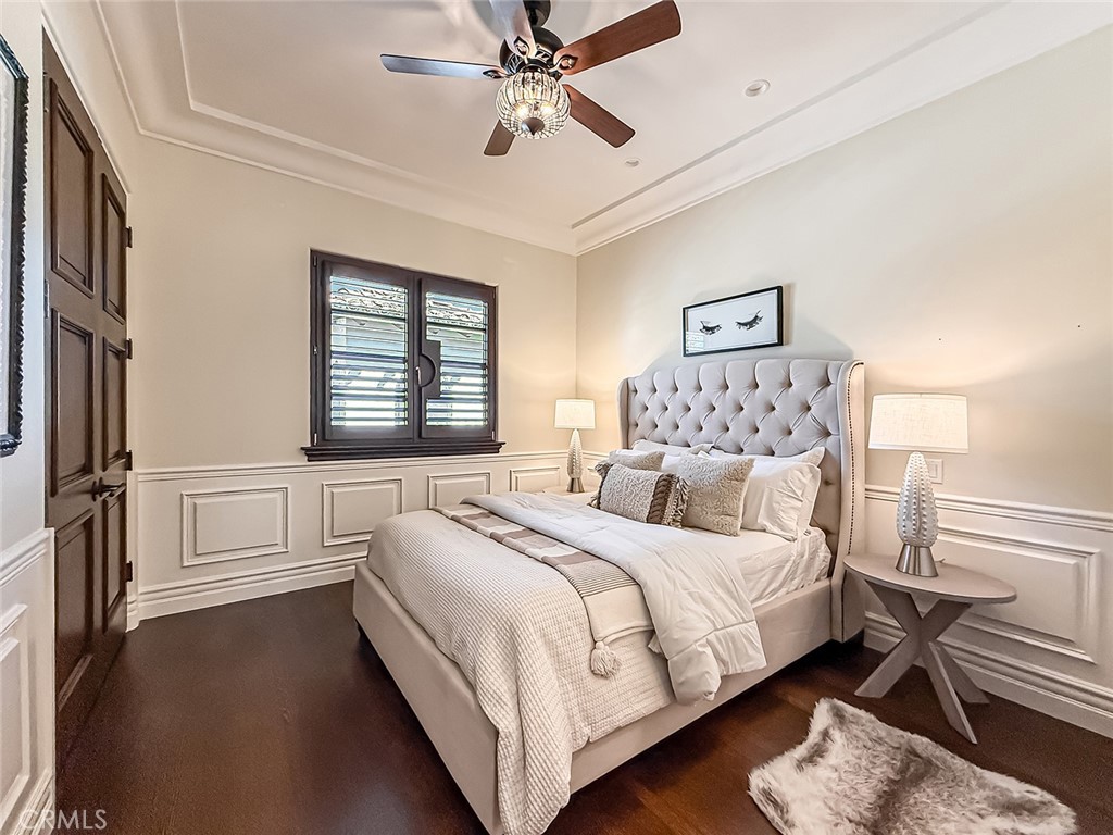 3826 Bowsprit Circle Westlake Village, CA 91361 - Photo 29 of 72 a bedroom with a large bed and a chandelier