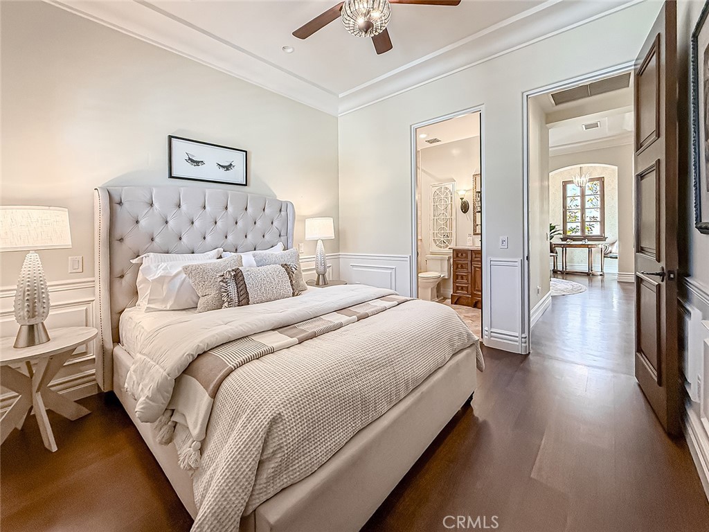 3826 Bowsprit Circle Westlake Village, CA 91361 - Photo 30 of 72 a spacious bedroom with a bed and a chandelier