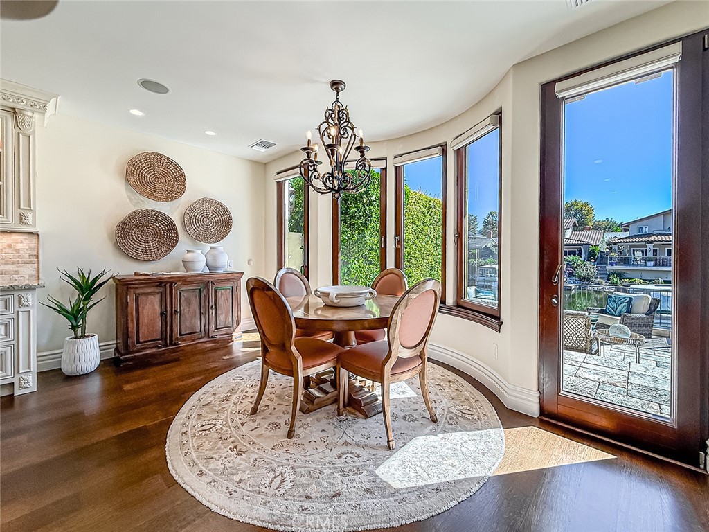 3826 Bowsprit Circle Westlake Village, CA 91361 - Photo 9 of 72 a view of a dining room with furniture window and wooden floor