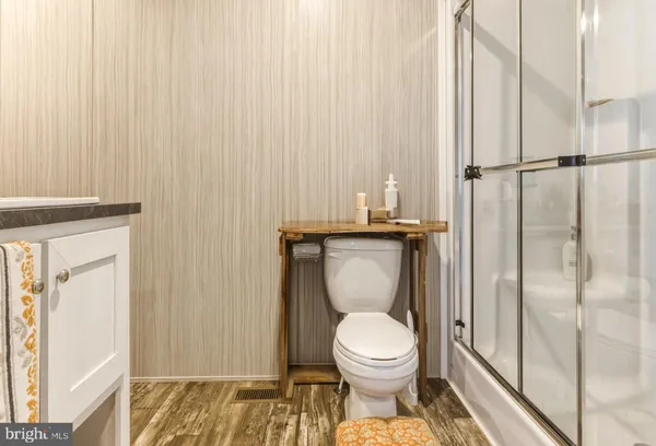a close view of a bathroom with a toilet