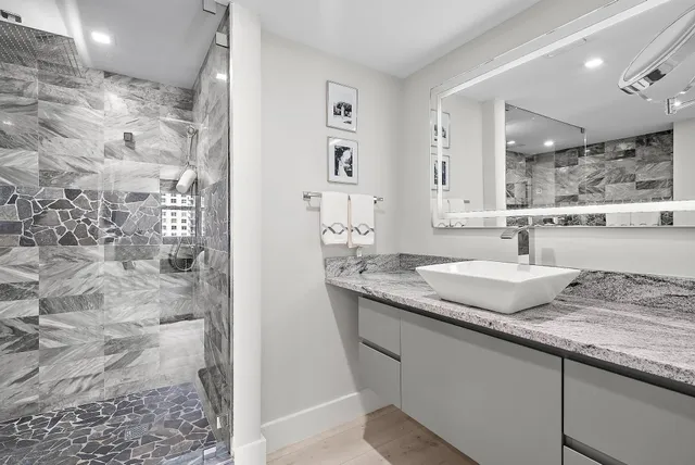 a bedroom with bed and window